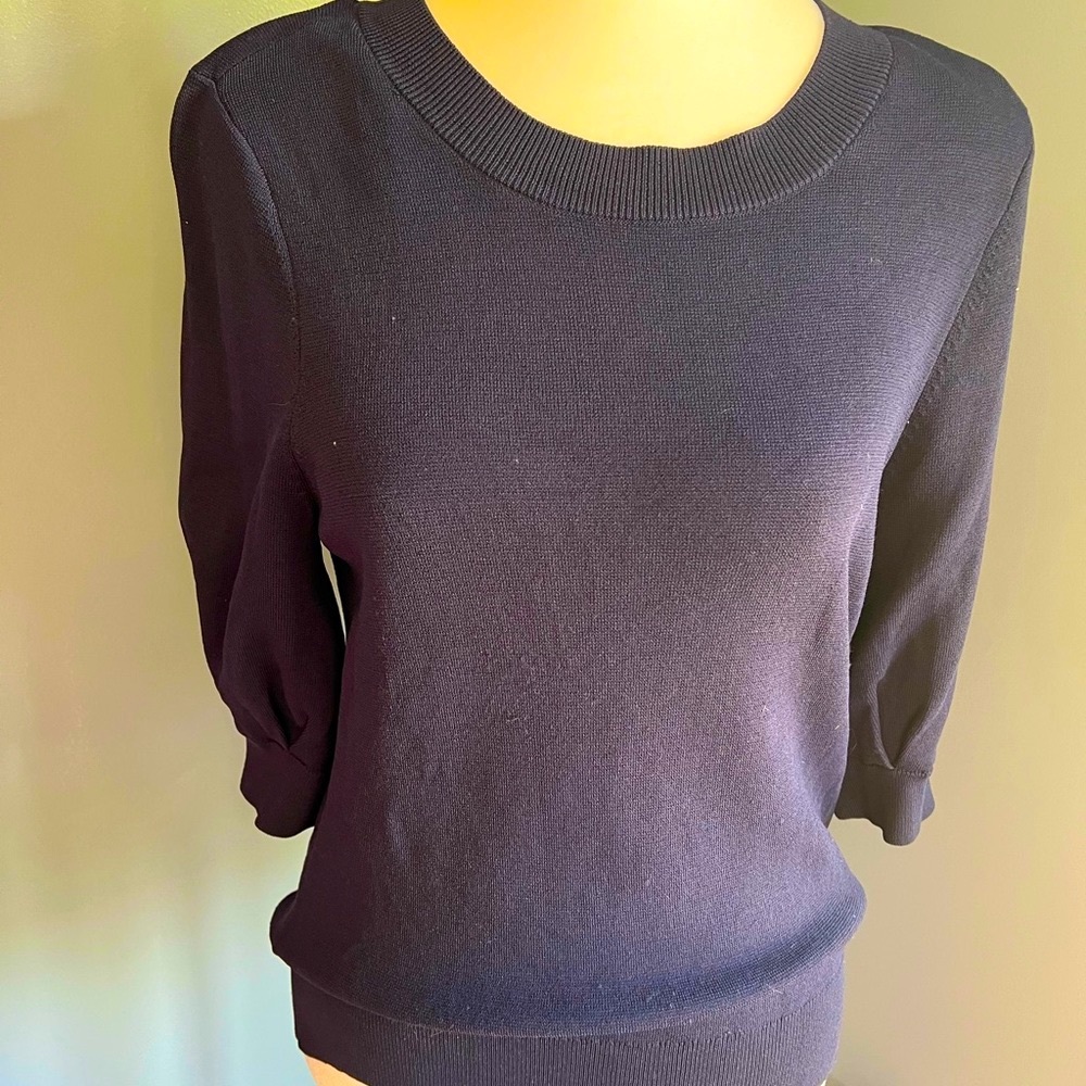 H&M navy top with cute stitch in sleeves